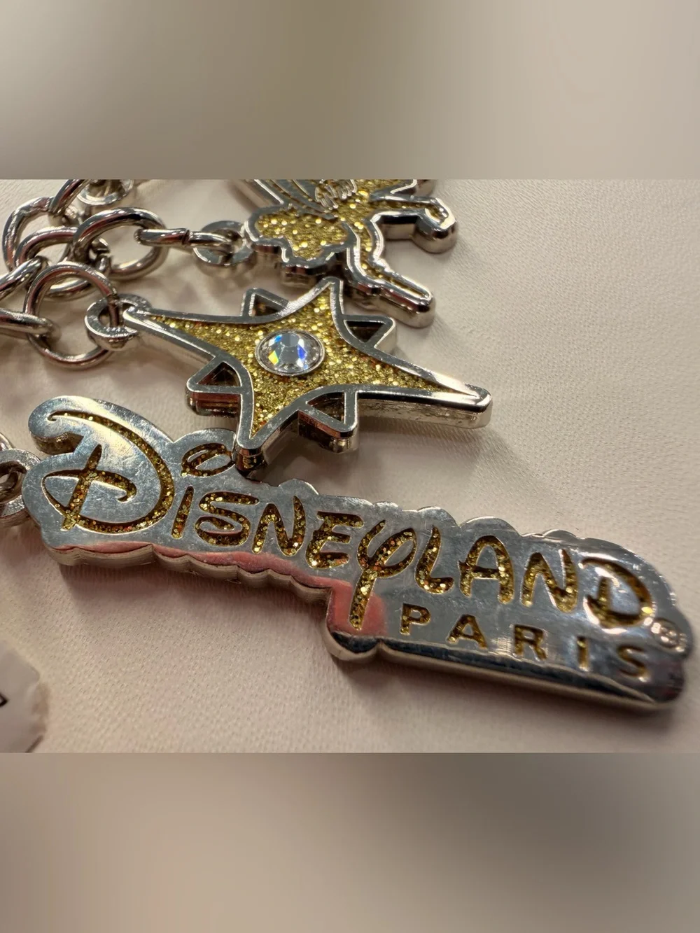 NWT Disneyland Paris Keychain Tinkerbell Sleeping Beauty Castle Gold Glitter
